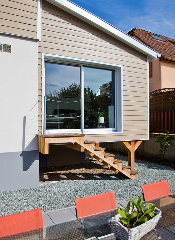 Agrandissement de maison : ossature bois et bardage fibro-ciment